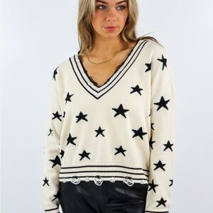 Ivory V-Neck Star Pattern Sweater with Black Stars